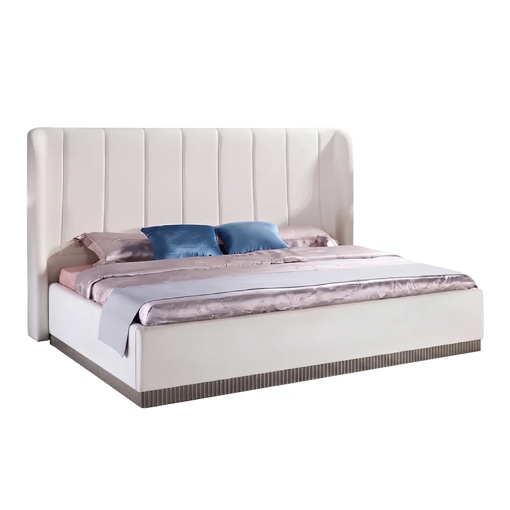 Cama tapizada con respaldo de alas curvas y canales verticales