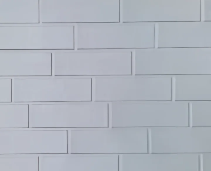 Panel metálico tallado ladrillo estándar gris claro 38,3 × 400