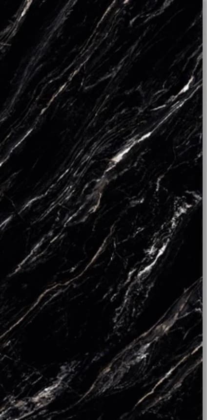 Porcelanato símil mármol oscuro mate con gránulos secos 60 × 120
