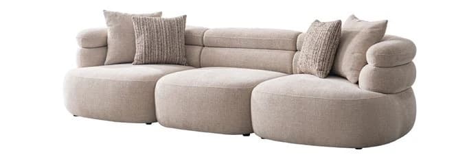 Sofá Represa · Sofá modular de asientos redondeados y respaldo en rollos 274 × 104 cm