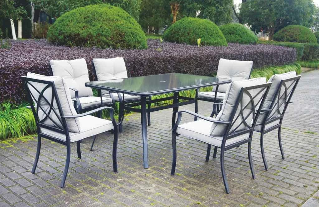 Juego de comedor de 7 piezas de acero, mesa de vidrio templado y sillas con almohadones