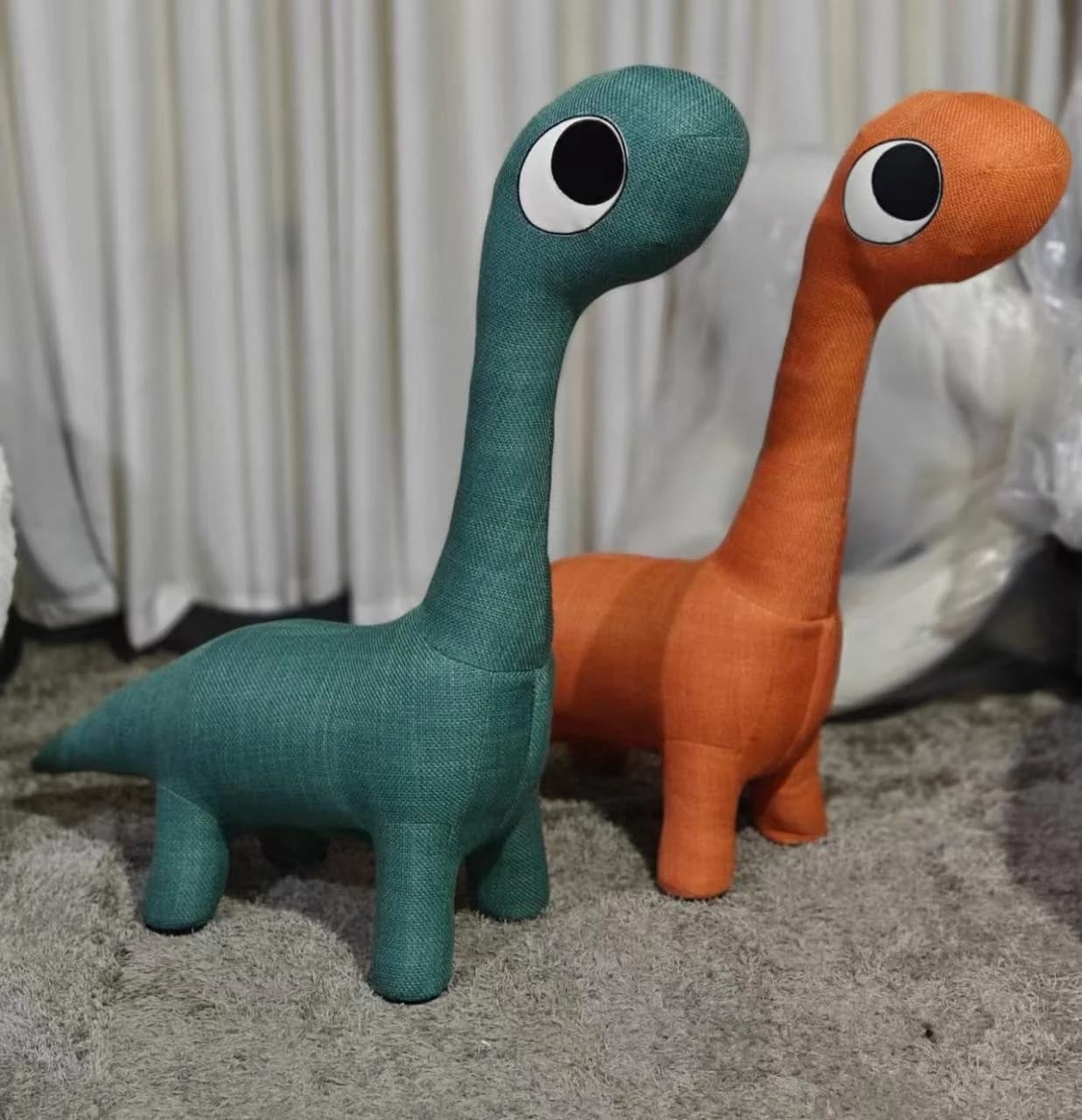 Puf Ichu · Puf con forma de dragón de ojos grandes 113 × 31 × 101 cm